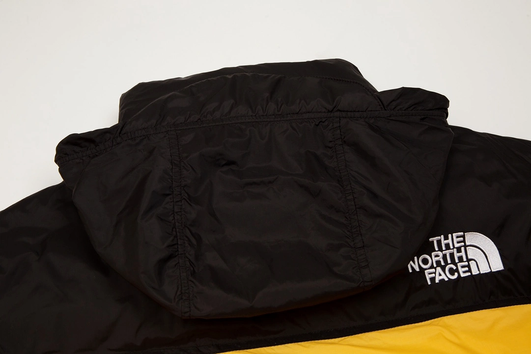 The North Face 1996 Classic Hidden Hood Down Jacket yellow 11.15