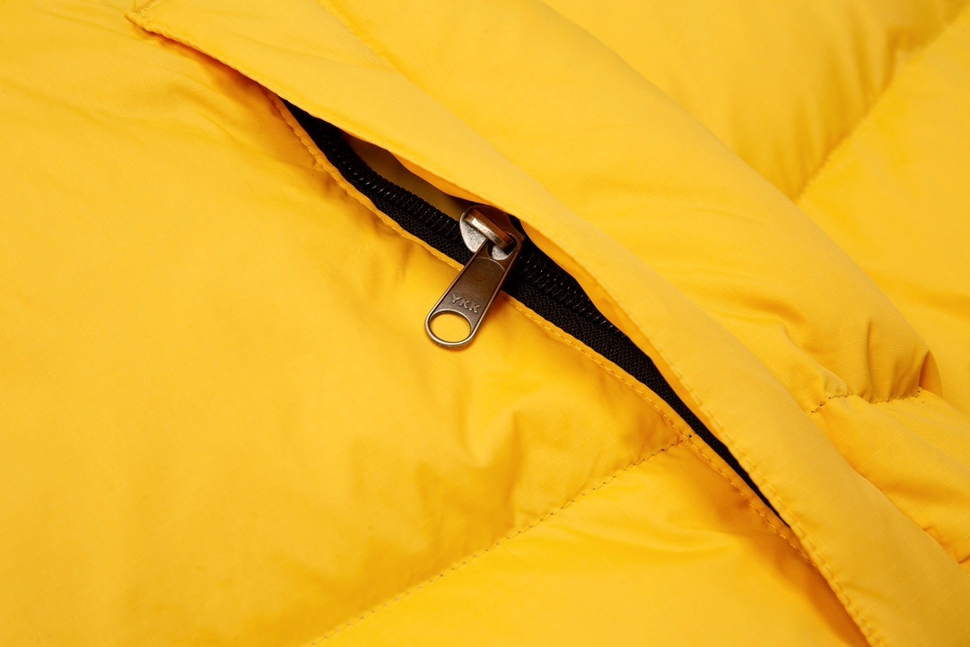 The North Face 1996 Classic Hidden Hood Down Jacket yellow 11.15